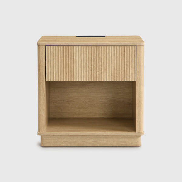 Nightstand with Charging Station, Bedside Table for Bedroom with 1 Drawer Storage, Night Stand for Bedroom,Natural Light wood ribbed nightstand with open storage shelf, wireless charging station, and built-in USB power outlets in a modern bedroom setting