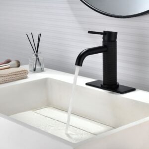 Matte black single handle bathroom sink faucet with textured knurled body, modern single-hole vanity faucet with deck plate for contemporary bathrooms