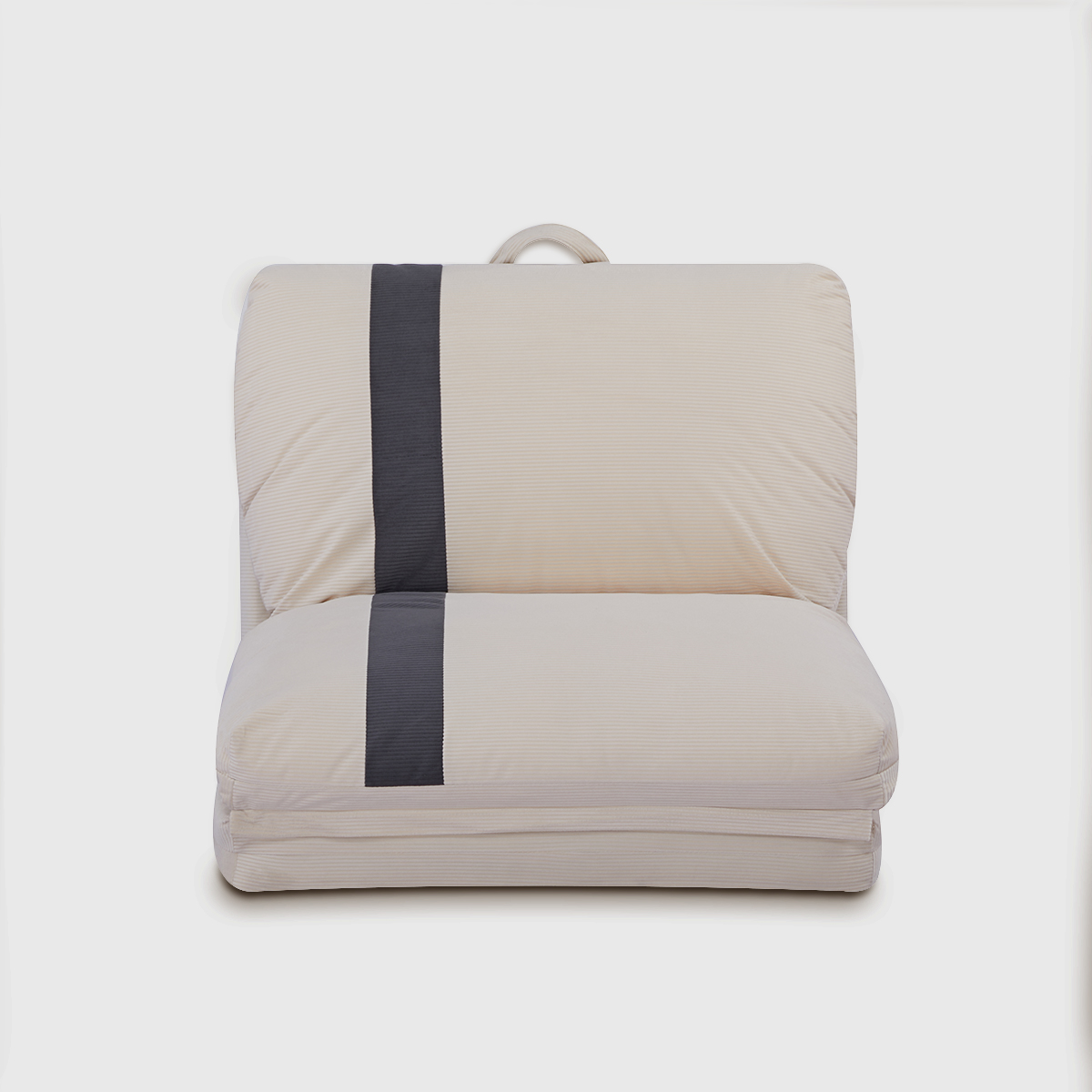 Adjustable beige floor sofa chair with foldable design, positioned as a chaise lounge in a modern minimalist living room