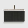 This 30 inch floating bathroom vanity with white ceramic sink is ideal. The striped brushed black oak finish complements modern decor, and the pre-assembled structure saves time. Its one-piece sink is easy to clean, the perfect modern bathroom vanity.