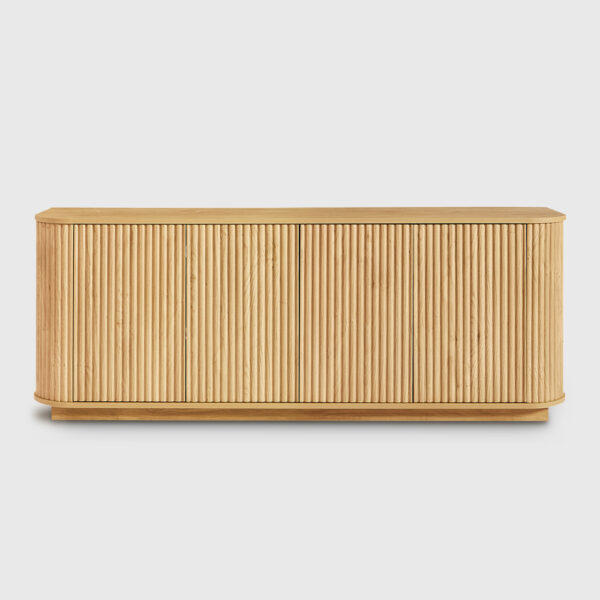 Oak-Modern-TV-Cabinet-for-Living-Room Light oak modern TV stand with double open storage cabinets, styled as a living room media console with decorative accessories and electronics storage