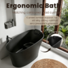 Matte white freestanding bathtub with ergonomic lumbar support and headrest